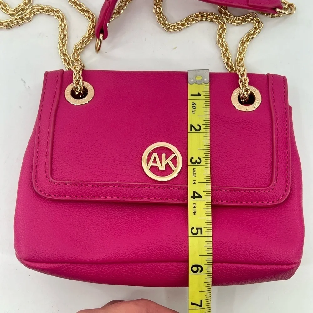 Anne Klein hot pink crossbody bag with gold chain strap and front flap w/ emblem